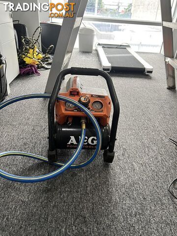 AEG air compressor with charger and battery