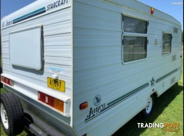 #2069 JAYCO STARCRAFT 17' SINGLE AXEL NEW ROLL OUT. HAS S/H WALLS. A RARE FULL FAN. FRONT KITCHEN. ISLAND BED. ALL ELECTRIC FRIDGE. PORTA POTTY. FRONT KITCHEN ISLAND BED TABLE COULD MAKE BED? THIS VAN IS A BARGAIN ALUMINIUM FRAME STRONGER & LIGHTER