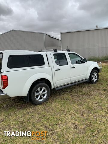 2012 Nissan Navara 550 DUAL CAB D40 S5 MY12 UTILITY 4X4 Ute Automatic