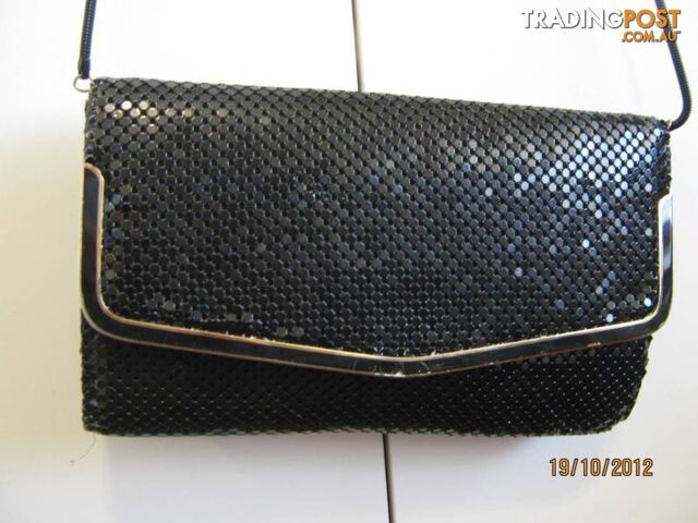 HANDBAGS, CLUTCH BAGS, BEAUTY CASES -- REDUCED PRICE