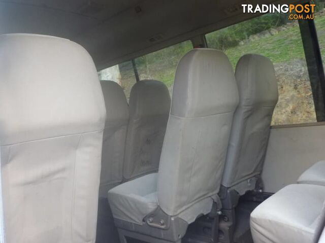 2004 Mitsubishi Rosa Bus White