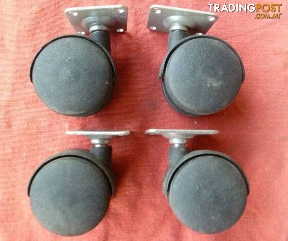 Set of Four (4) New 40mm Twin Wheel Swivel Castors - photo 2 of 3