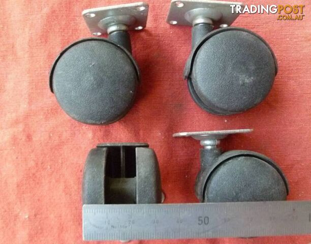 Set of Four (4) New 40mm Twin Wheel Swivel Castors - photo 3 of 3