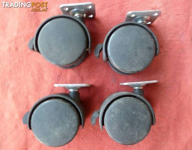 New Set of Four (4) 50mm Twin Wheel Swivel Castors With Brakes - photo 2 of 5