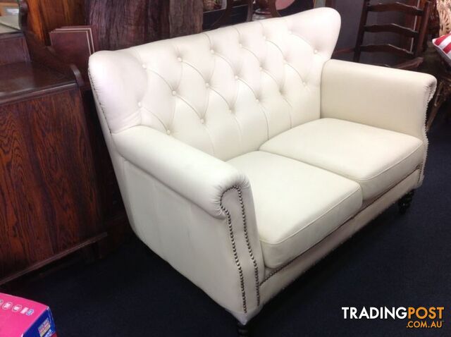 BRAND NEW Bone coloured high grade leather 2 seater sofa