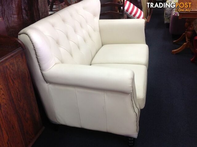BRAND NEW Bone coloured high grade leather 2 seater sofa - photo 2 of 10