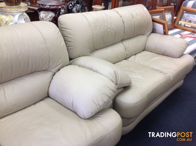 Cream leather 2 seater sofas - 2 available