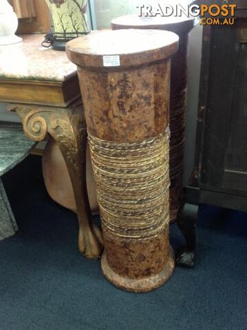 Marble look pillar with rope accents. Plant stand or ornament