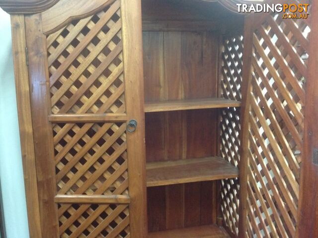 Teak lattice storage cabinet. Books, videos, drinks cabinet