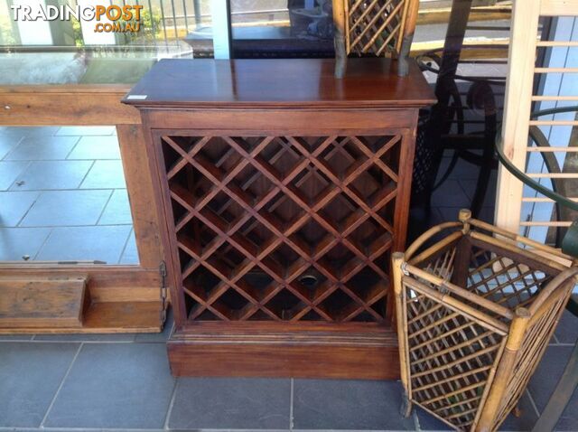 Wine cabinet in timber holds 24 bottles
