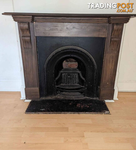 Cast iron fireplace and mantle