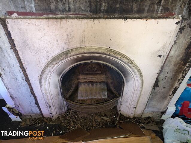 2 x cast iron fireplaces and shielding and mantle pieces (buyer can buy individual)