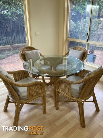 Casual Cane and Glass Dining table and chairs