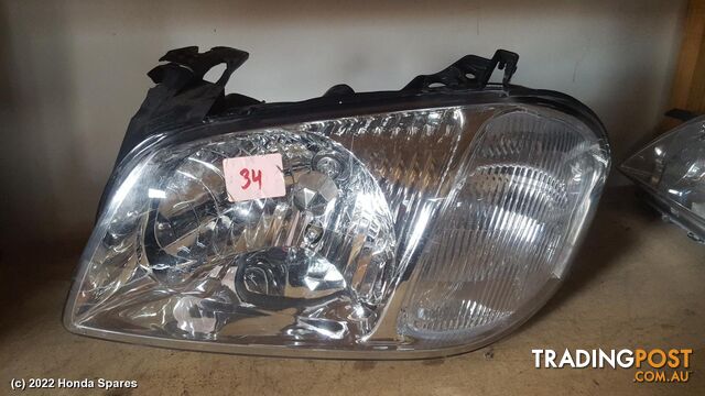 2003 MAZDA - TRIBUTE Grille