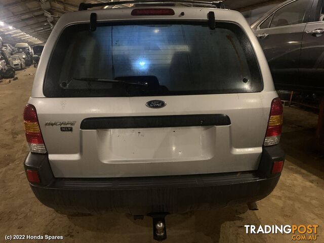 2003 FORD - ESCAPE Right Rear Trailing Arm - photo 5 of 70