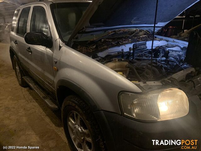 2003 FORD - ESCAPE Right Rear Trailing Arm - photo 4 of 70