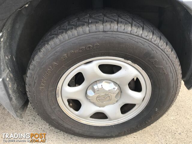 Console 2003 MAZDA TRIBUTE