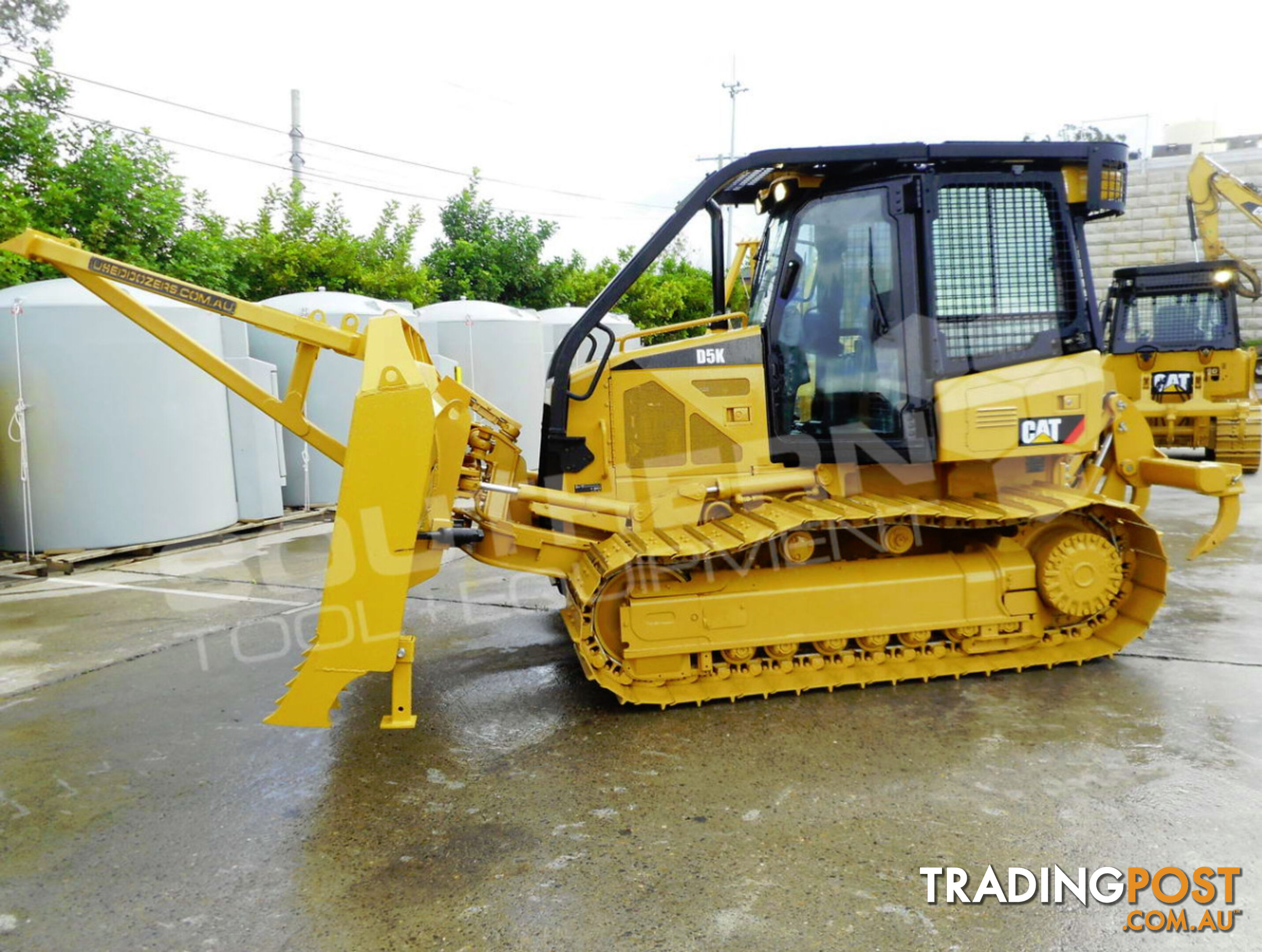 Caterpillar D5K WT Bulldozer with Drive in Stick Rake Tree Spear